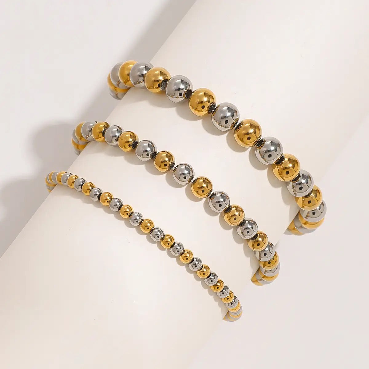 TWO TONED BEADED BRACELETS