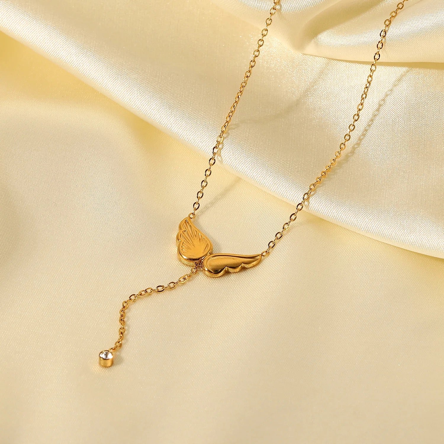 ASYMMETRIC WING NECKLACE